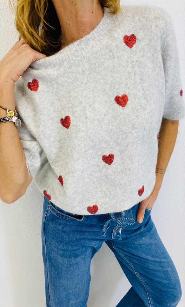 Pull coeurs rouges